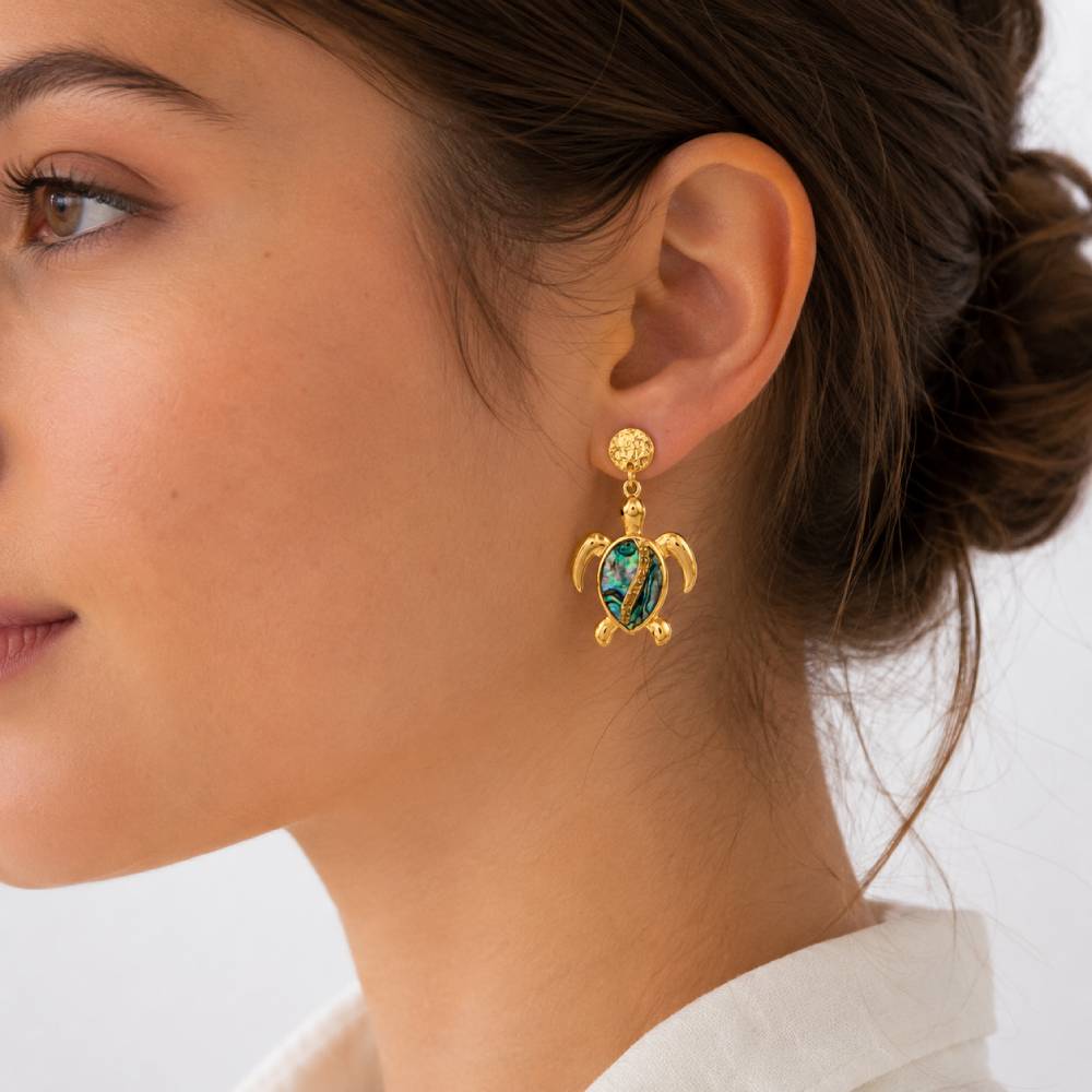 gold-steel-sea-turtle-earrings-model