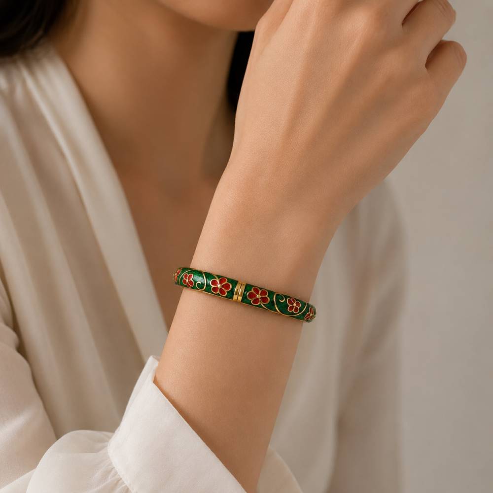 gold-tone-enamel-floral-bangle-bracelet-green-red-model
